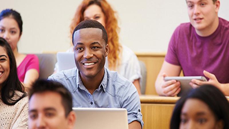 Image of classroom with male student